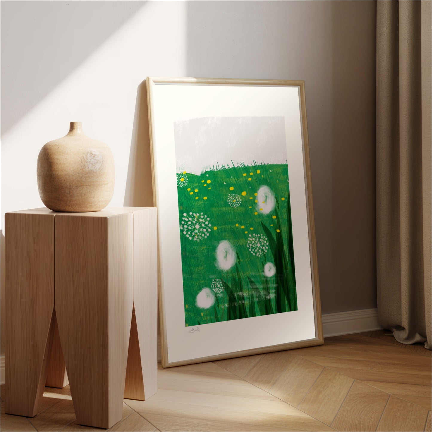 Resting Field art print in a wood frame leaning against a wooden stand in a minimal interior, OAM Studio